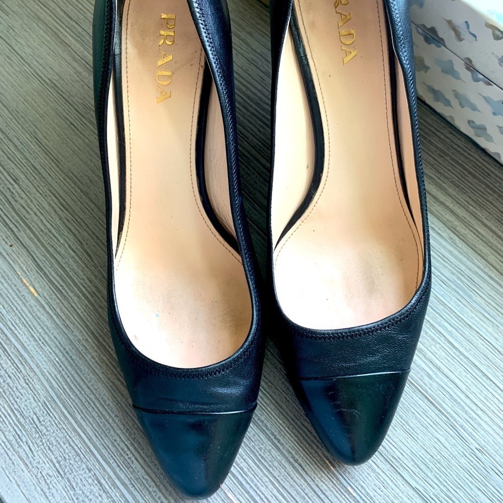 Prada round tip black heels